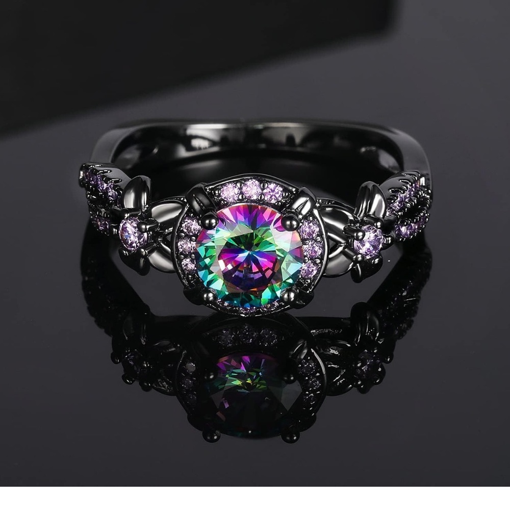 Voluka- Iridescent Black Ring with Purple Accents and earrings